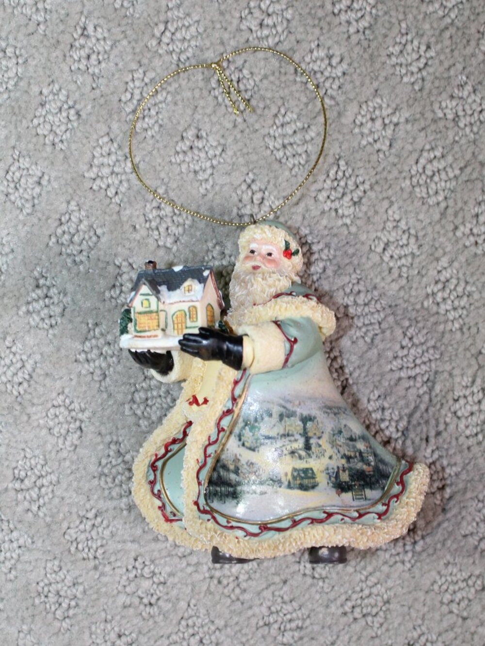 Aqua 4" Resin Santa Claus Holding House with Winter Scene on Coat Ornament